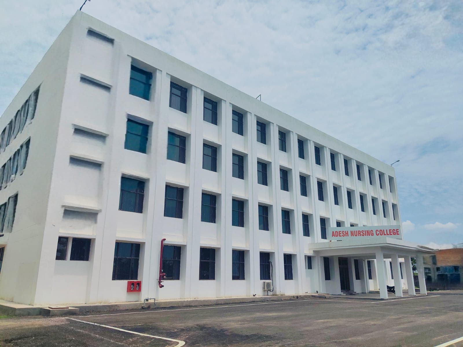 Adesh University logo