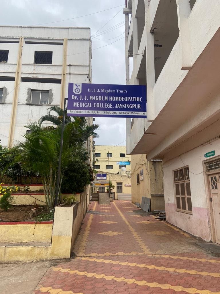 Dr. J.J. Magdum Homoeopathic Medical College logo